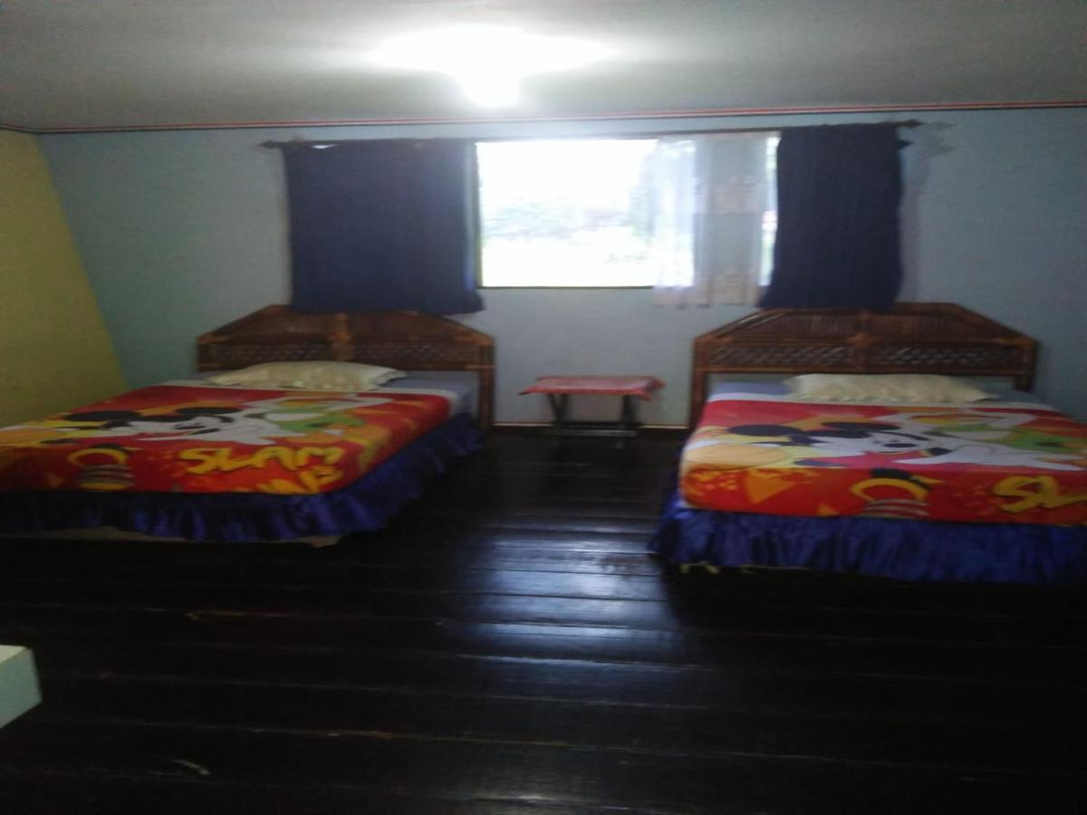 Roman Sinasi Hotel Tongging Buitenkant foto