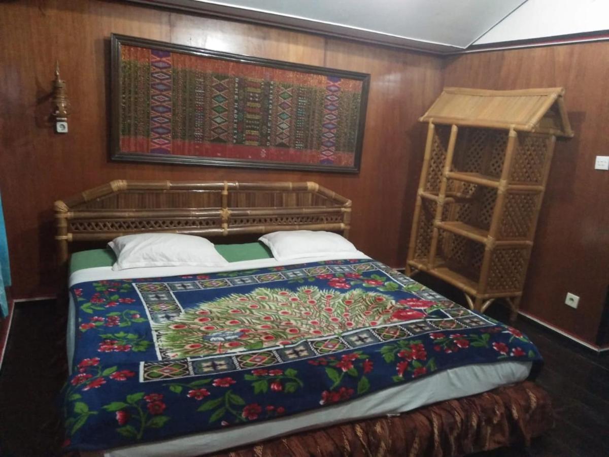Roman Sinasi Hotel Tongging Buitenkant foto