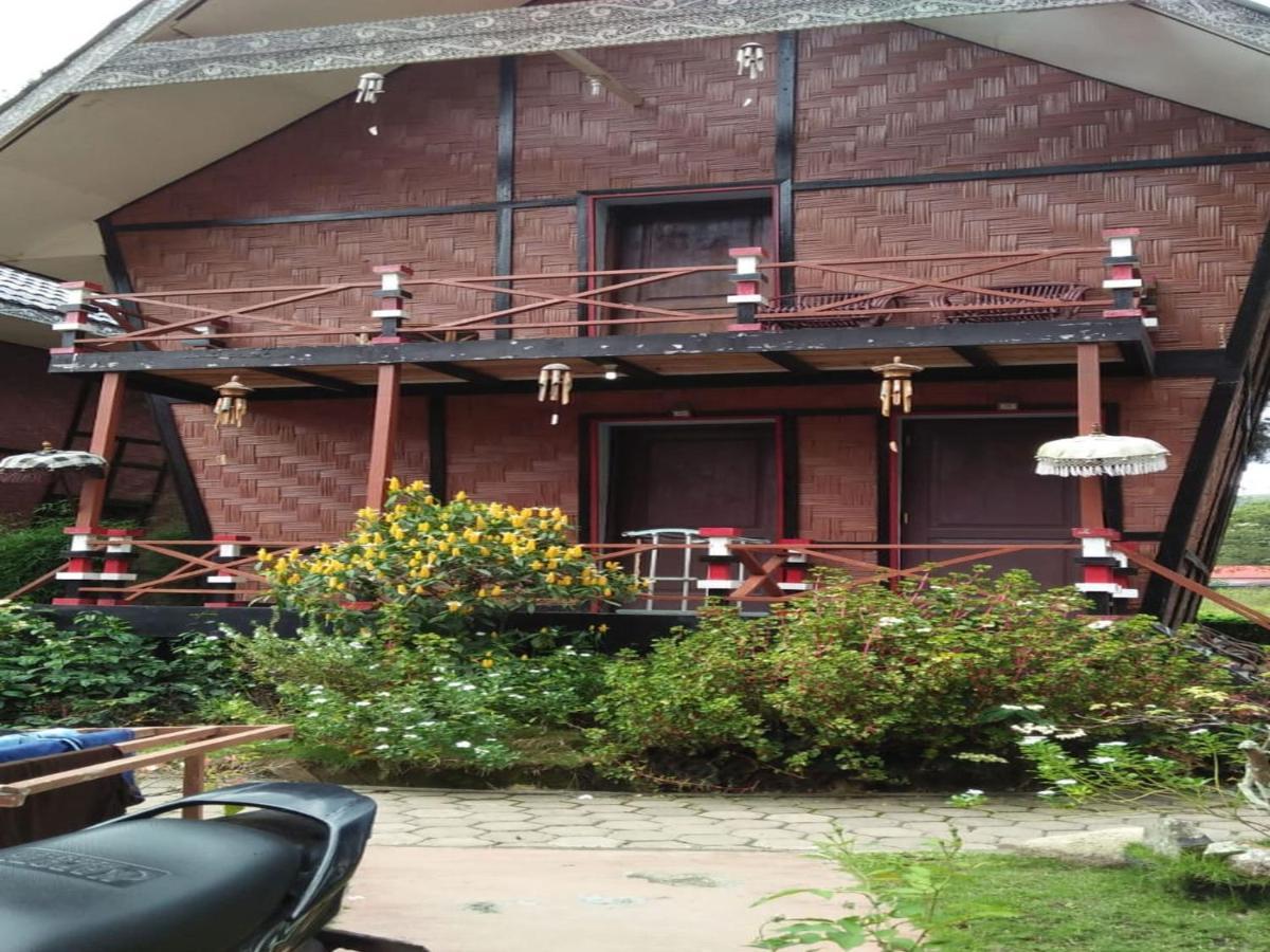 Roman Sinasi Hotel Tongging Buitenkant foto